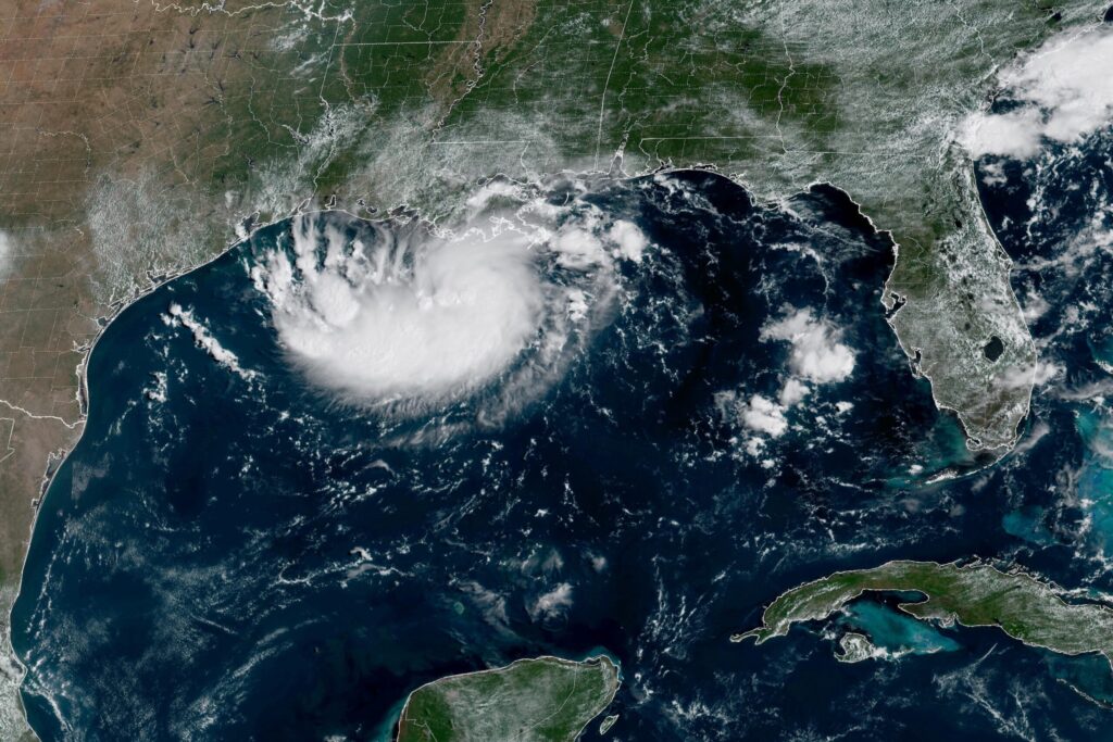 Coastal Texas and Louisiana warned of tropical storm as a potential hurricane moves toward Hawaii