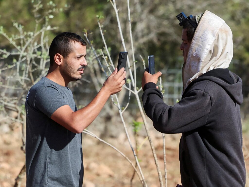 Israeli settlers surround Palestinian home in occupied West Bank’s Qusra | Israel-Palestine conflict News