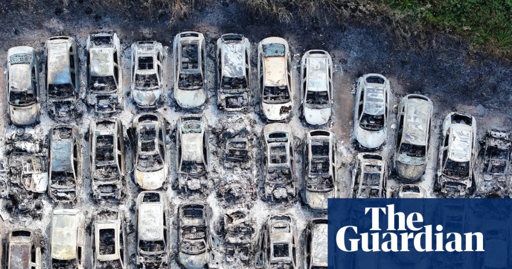 Man arrested on suspicion of arson after fire at car park used by Gatwick passengers | England