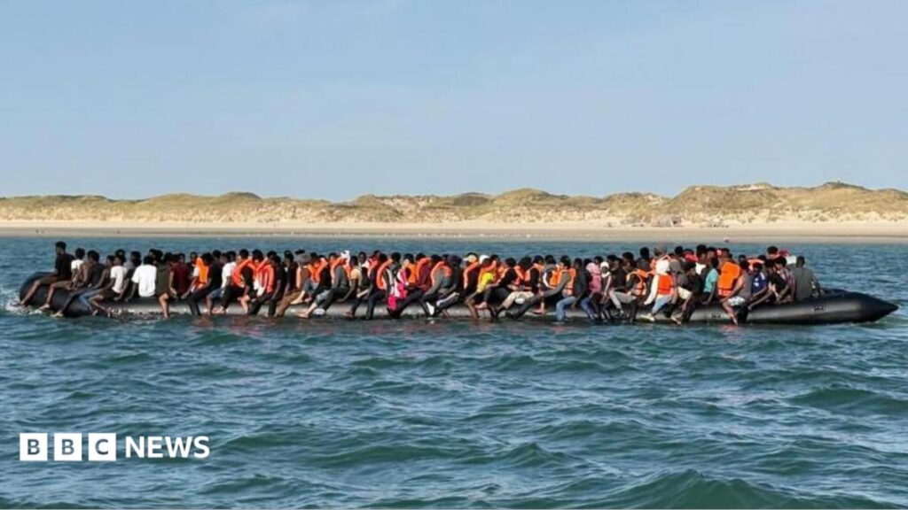 Record 230 people cross English Channel in one small boat