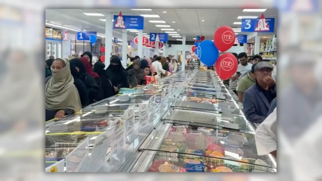 Does video show UK shoppers standing in lines separated by gender? We examined the footage