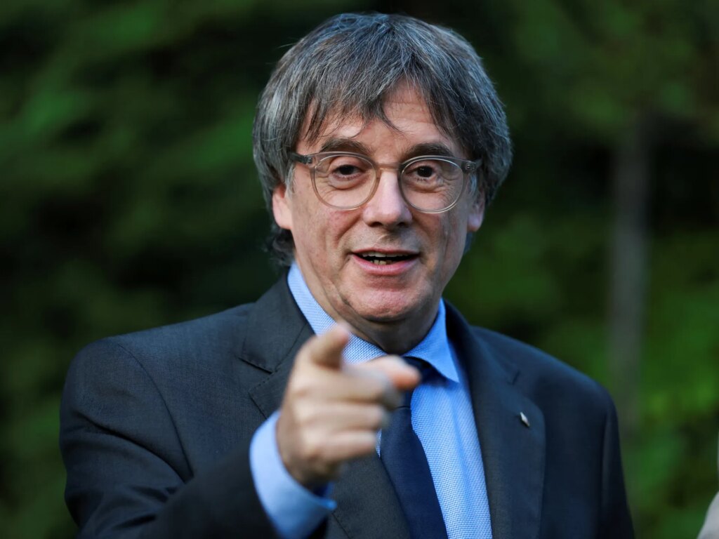 Catalan separatist Puigdemont to return to Spain after warrant lifted | Elections News