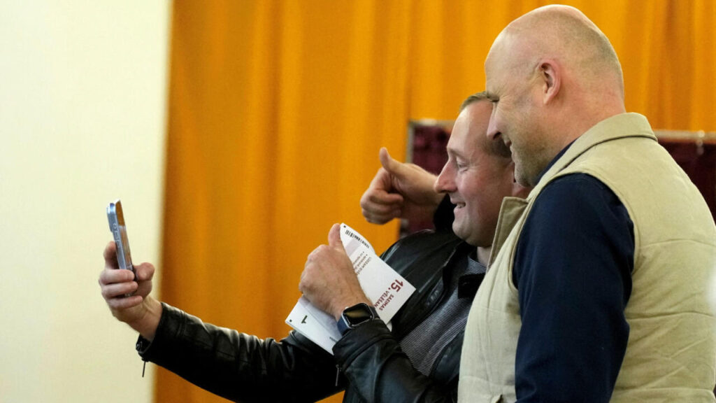 Latvia exit polls put PM’s pro-Ukraine party ahead but coalition partners stumble