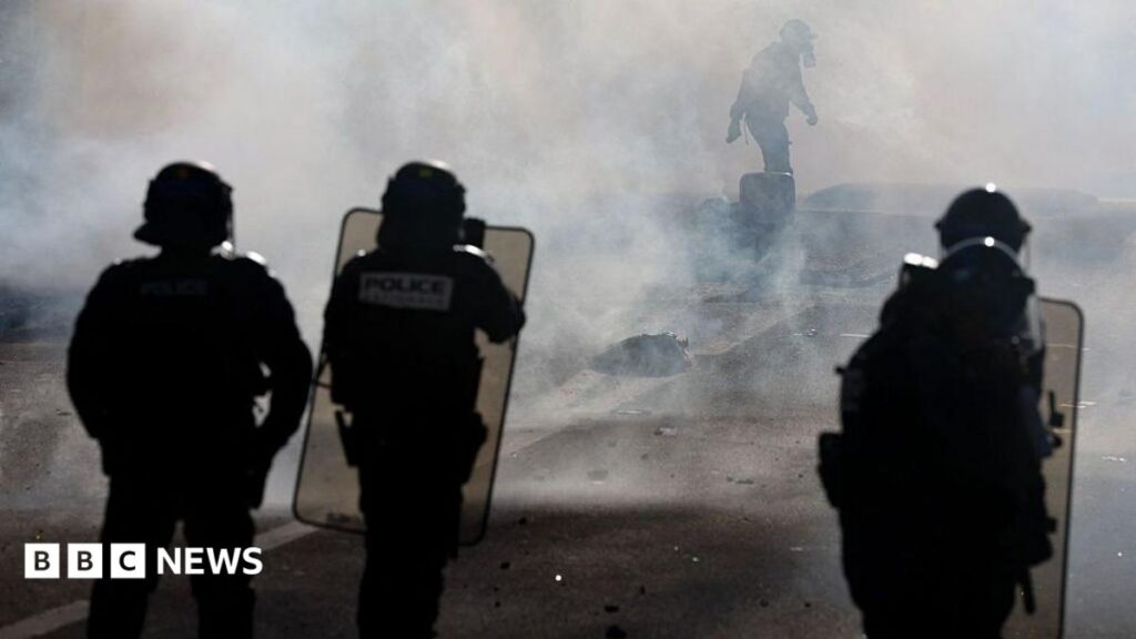 Teenager’s hand blown off during confrontation between France school protesters and riot police
